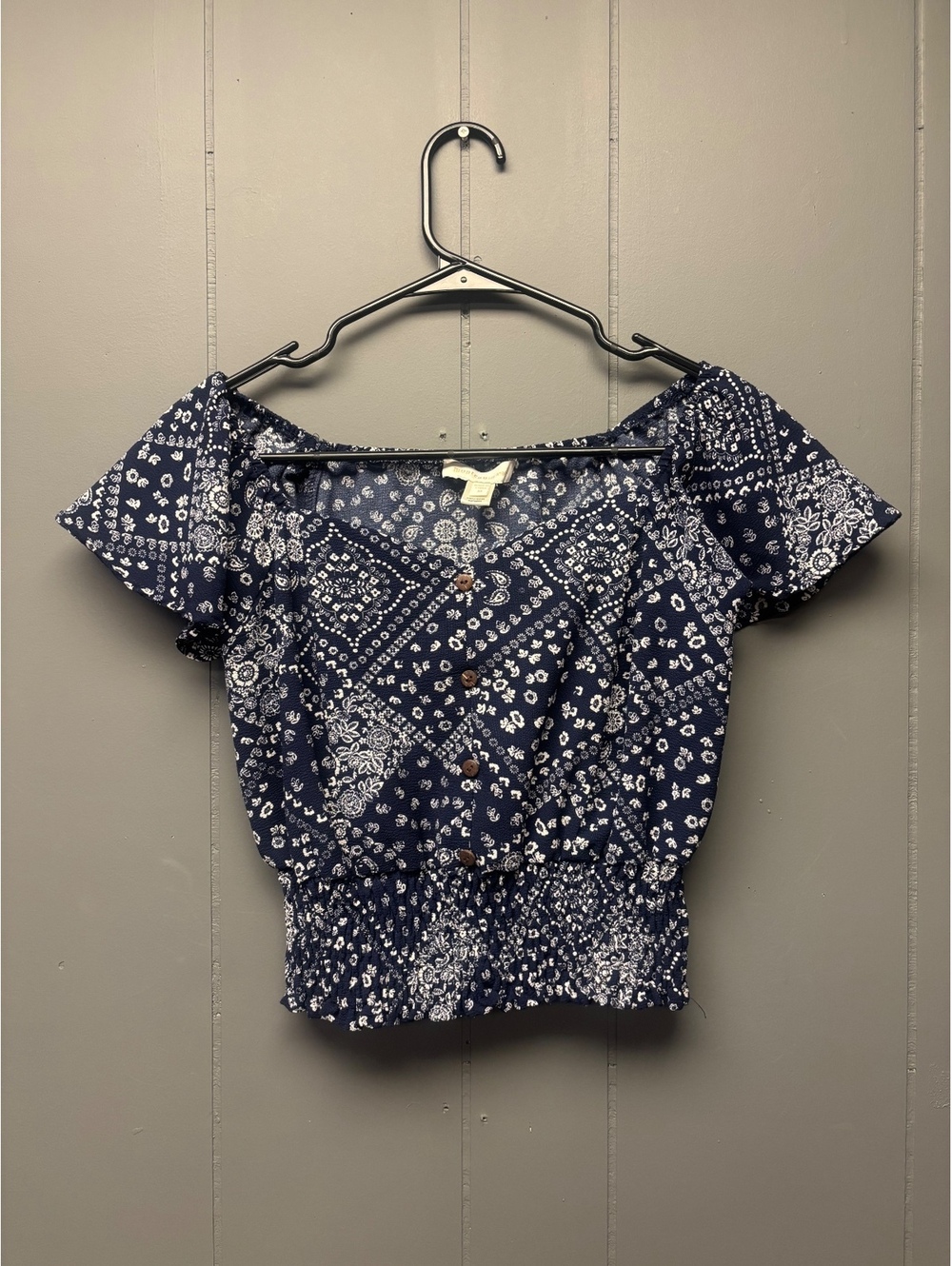 blue floral off shoulder smocked crop top